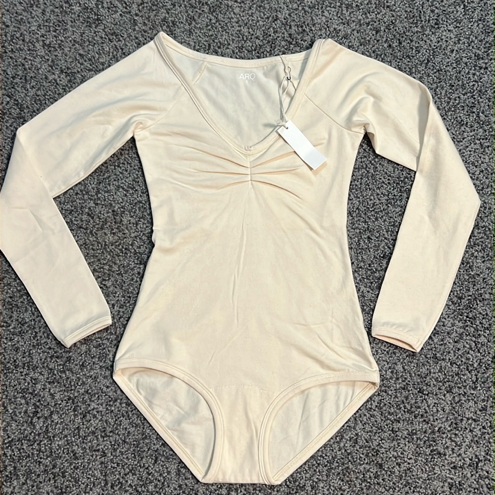 ARQ Long-Sleeve Bodysuit Size Cream Colored Small NWT